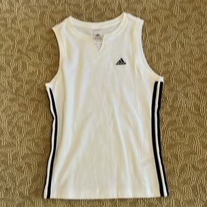 Woman’s white with decorative blue piping short sleeve top